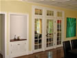 Triple glass french doors are the beautiful focal point of this family room in Ocean County, Lavallette, NJ