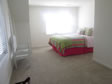 Notice the sunlight entering this bedroom through the dormer on the side of the home.