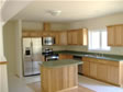 The center island with countertop overhang adds a simple and functional area to this traditional kitchen