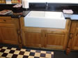 Custom oak kitchen designed with oversized “Farm Sink” is perfect for lots of dirty large pots & pans