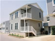 This Ocean County, Chadwick Beach, NJ modular home has an excellent view of the water from these two porches 