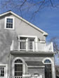 Second floor deck with sliding glass doors from the master bedroom of this Monmouth County, Manasquan, NJ home