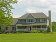 Come relax on the full front porch of this country farmhouse in Monmouth Country, NJ