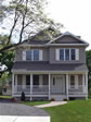 Gable-end modular home with full front porch built by RBA Homes in Ocean County