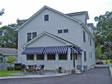 All-season enclosed rear porch is an inviting feature of this Jersey Shore modular home