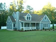 Expanded Cape with dormer and custom screened rear porch