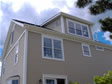 A rear third floor shed dormer gives more light and space to this Monmouth County, NJ home