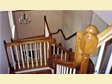 Oak stained winding stairs lead to a finished third floor on this home in Monmouth County, Sea Girt, NJ 